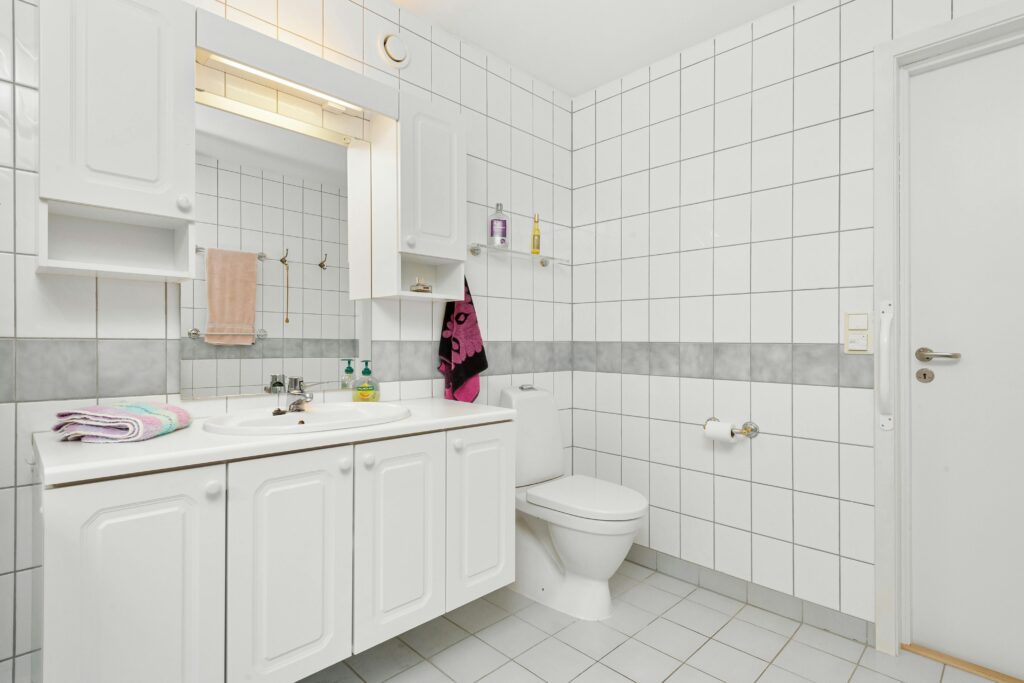 Cabinet and Toilet in a Bathroom